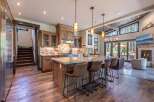 This stunning kitchen boasts a spacious island with seating, perfect for entertaining.