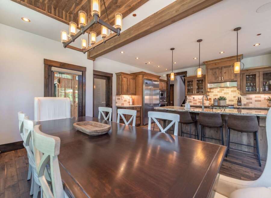 Step into luxury with this stunning kitchen and dining area! Featuring a spacious layout, the open-concept design seamlessly blends the kitchen and dining spaces, perfect for entertaining.