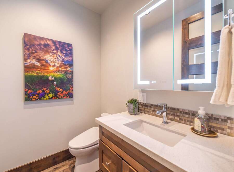 This stunning bathroom boasts a modern design with a touch of elegance.