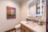 This stunning bathroom boasts a modern design with a touch of elegance.
