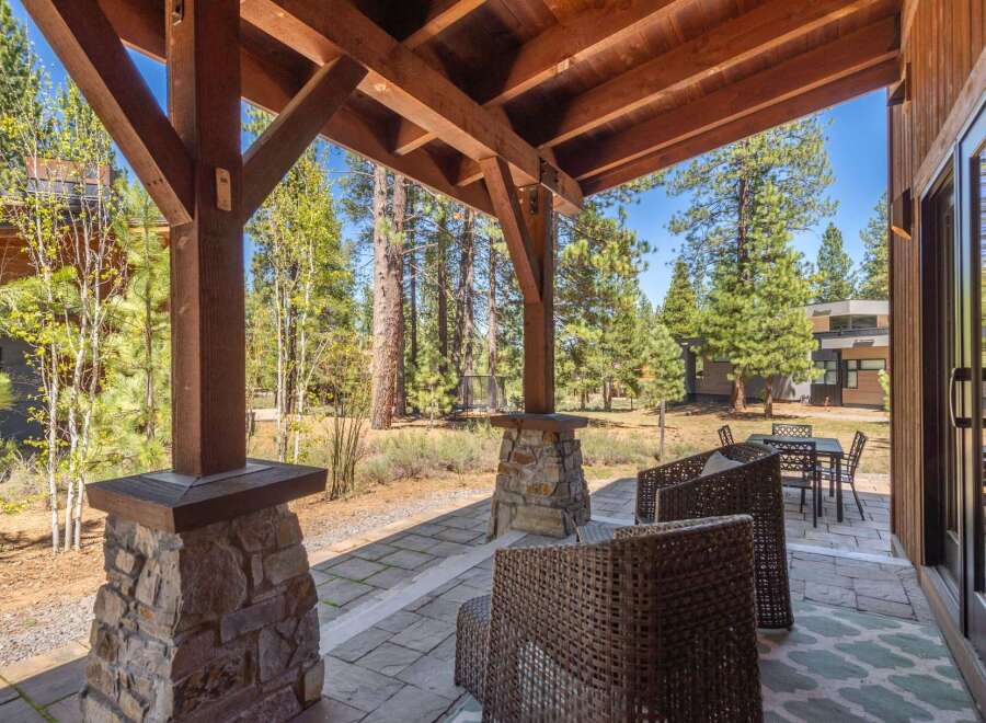 Step into luxury with this stunning property featuring a covered patio, perfect for enjoying the outdoors.