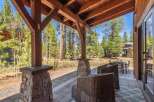 Step into luxury with this stunning property featuring a covered patio, perfect for enjoying the outdoors.
