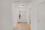 Step into this inviting entryway, featuring a bright and airy atmosphere.