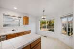 This charming kitchen boasts a bright and airy atmosphere, perfect for culinary adventures.