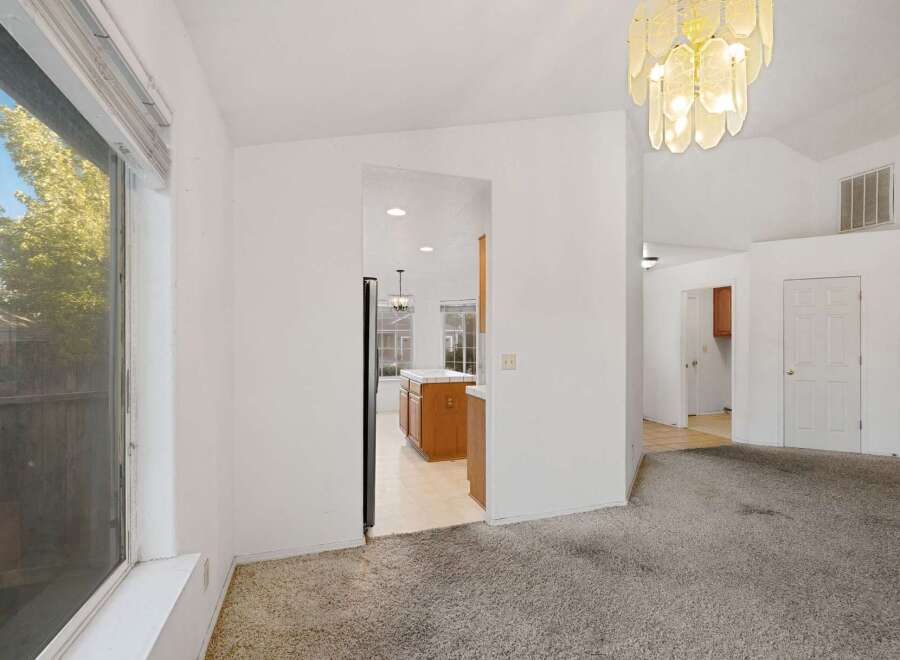 Step into this inviting home featuring a bright and airy living space.