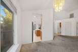 Step into this inviting home featuring a bright and airy living space.