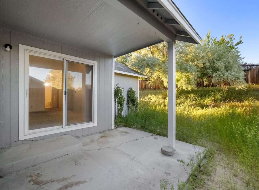 Discover the charm of this property featuring a covered patio, perfect for enjoying the outdoors.