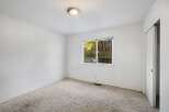 Discover the potential of this inviting space! This room features a bright window that offers natural light and a view.