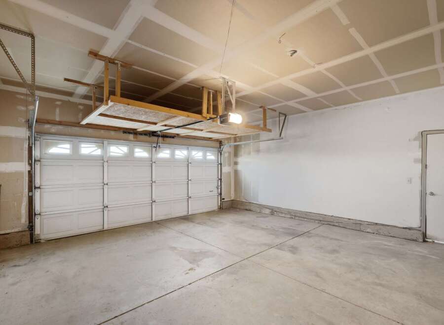 Discover the potential of this spacious garage, perfect for storage or projects.