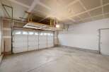 Discover the potential of this spacious garage, perfect for storage or projects.