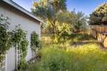 Discover the charm of this property, featuring a beautifully landscaped yard and a serene outdoor space.