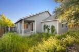Discover this charming property featuring a well-maintained exterior and inviting outdoor space.