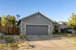 Discover this charming property featuring a spacious garage and a well-maintained exterior.
