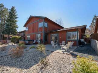 This stunning property boasts a spacious outdoor patio, perfect for entertaining or relaxing.