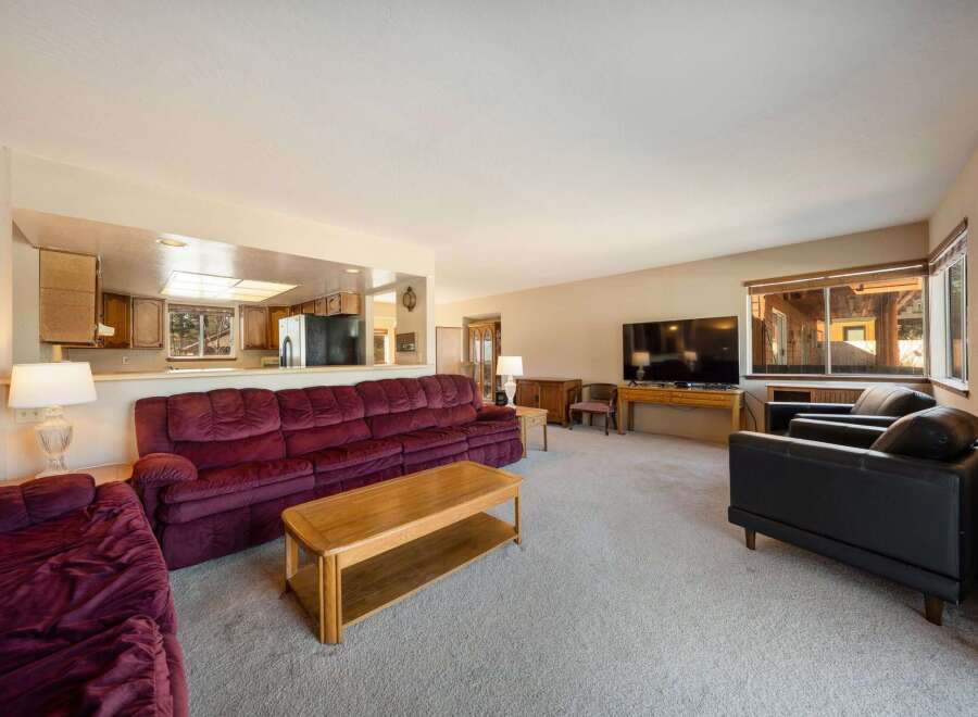 Step into this inviting living space, perfect for relaxation and entertaining.