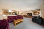 Step into this inviting living space, perfect for relaxation and entertaining.