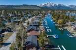 Discover waterfront living at its finest! This stunning property boasts direct access to a serene lake, perfect for boating and water activities.