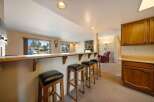 This stunning property boasts a stylish bar area, perfect for entertaining guests.