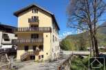 Discover this charming property featuring multiple balconies, offering stunning views of the surrounding mountains.