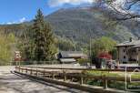 Discover a charming property nestled in a picturesque mountain setting.