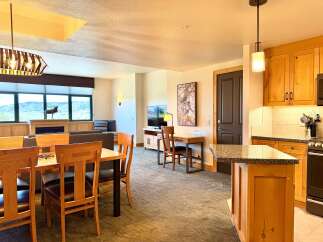 Step into luxury with this stunning property, featuring a spacious open-concept living area.