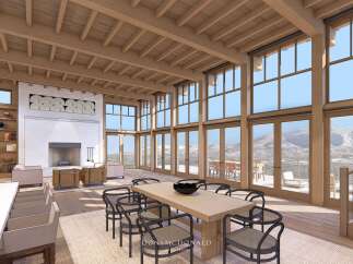 Experience luxury living in this stunning property, featuring a spacious open-concept design with soaring ceilings and expansive windows that frame breathtaking mountain views.