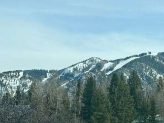 Enjoy breathtaking mountain views from this stunning property! This home offers easy access to ski slopes and trails, perfect for outdoor enthusiasts.