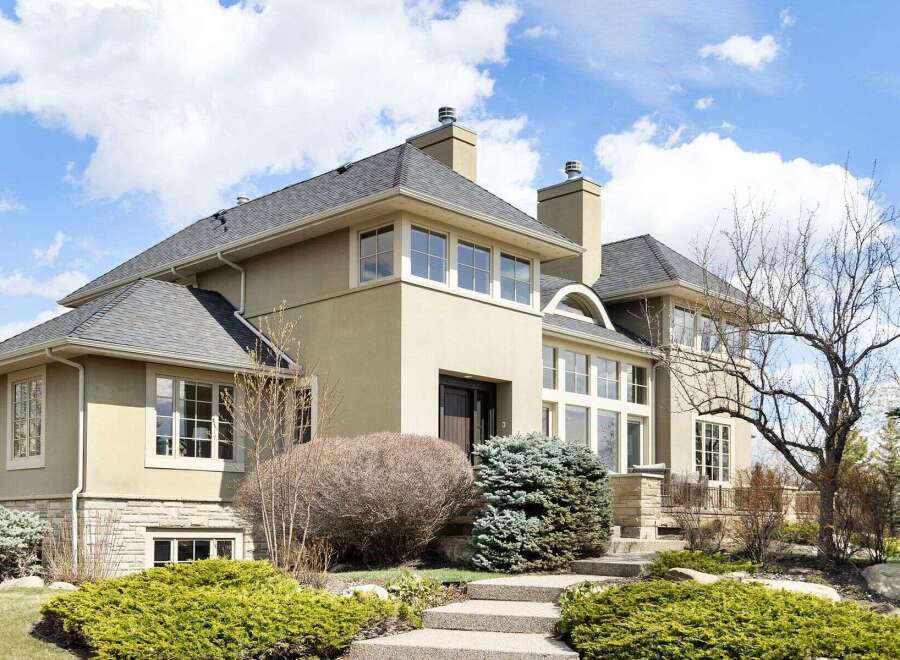This stunning property boasts a modern design with a neutral color palette, creating a sophisticated and inviting atmosphere.