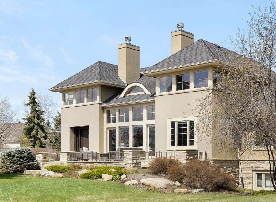 This stunning property boasts a modern design with expansive windows that flood the interior with natural light.