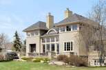 This stunning property boasts a modern design with expansive windows that flood the interior with natural light.