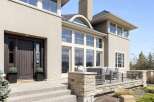 This stunning property boasts a modern exterior with a welcoming entrance.
