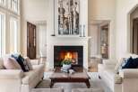 Experience luxury living in this stunning property, featuring a cozy fireplace perfect for chilly evenings.