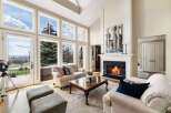Experience luxury living in this stunning property, featuring expansive windows that flood the space with natural light and offer breathtaking views.