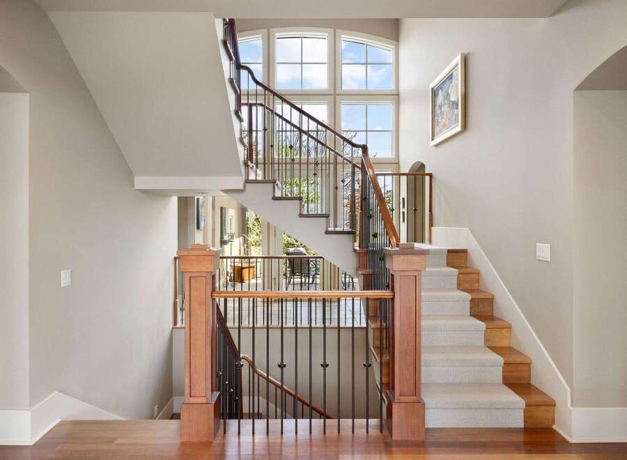 This stunning property boasts a grand staircase, perfect for making a statement.