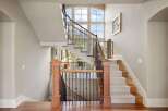 This stunning property boasts a grand staircase, perfect for making a statement.