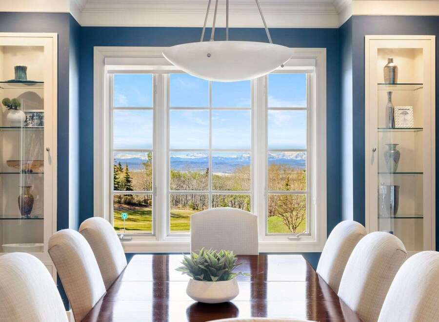 Experience breathtaking views from this elegant dining room.