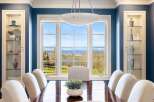 Experience breathtaking views from this elegant dining room.