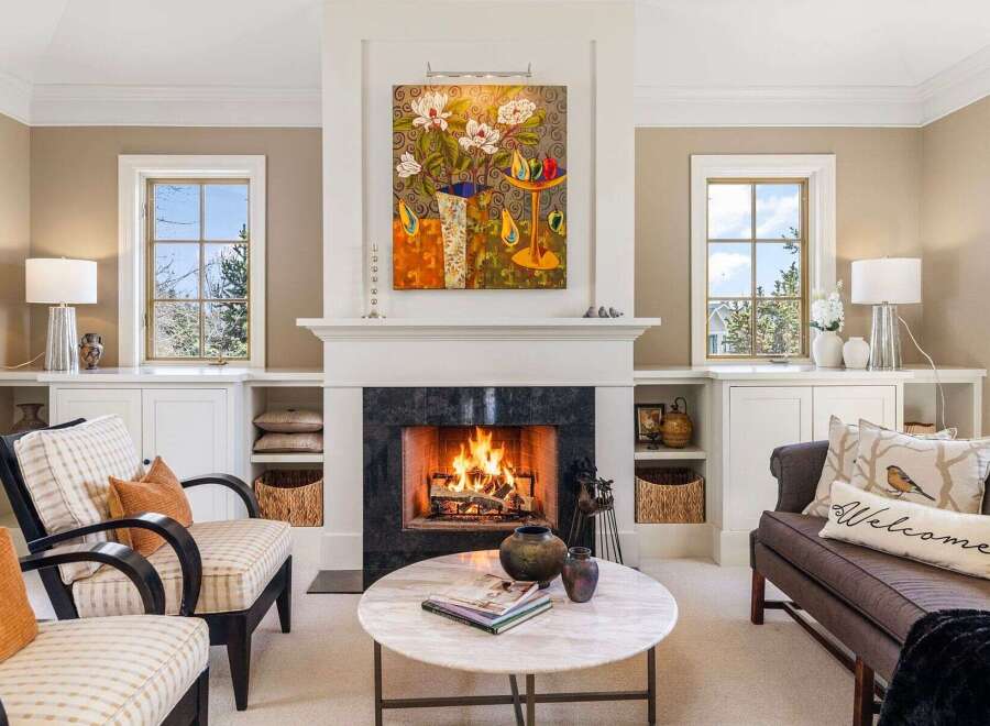 This stunning living room features a cozy fireplace, perfect for relaxing on chilly evenings.