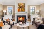 This stunning living room features a cozy fireplace, perfect for relaxing on chilly evenings.