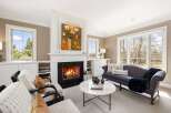 Experience luxury living in this stunning property featuring a cozy fireplace, perfect for chilly evenings.