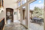 Step into luxury with this stunning property, featuring an inviting entryway that leads to a bright and airy living space.