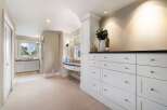 Step into luxury with this stunning property featuring a spacious master suite.