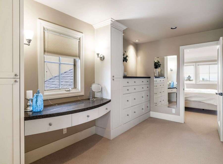 This luxurious property boasts a beautifully designed vanity area, perfect for getting ready in style.