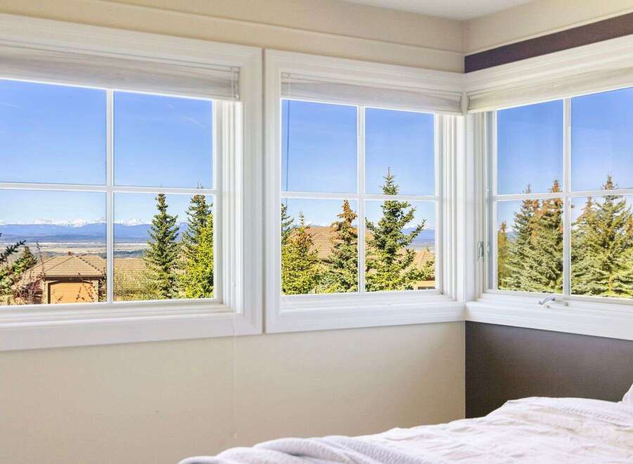 Enjoy breathtaking views from this stunning property! This home features large windows that offer panoramic vistas of the surrounding landscape.
