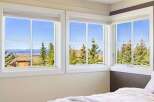 Enjoy breathtaking views from this stunning property! This home features large windows that offer panoramic vistas of the surrounding landscape.