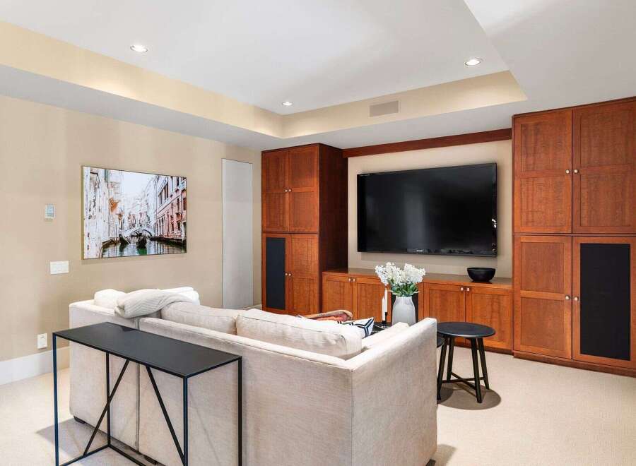 This stunning living room boasts a modern design with a touch of elegance.