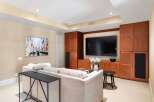 This stunning living room boasts a modern design with a touch of elegance.