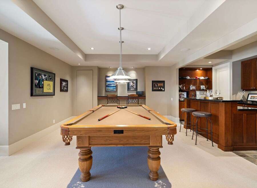 This luxurious property boasts a stunning billiards room, perfect for entertaining guests.