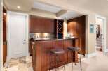 This stunning property boasts a beautifully designed bar area, perfect for entertaining guests.