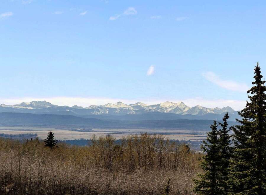 Experience breathtaking mountain views from this stunning property.